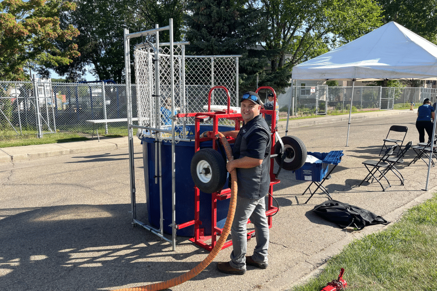 Man filling up water storage